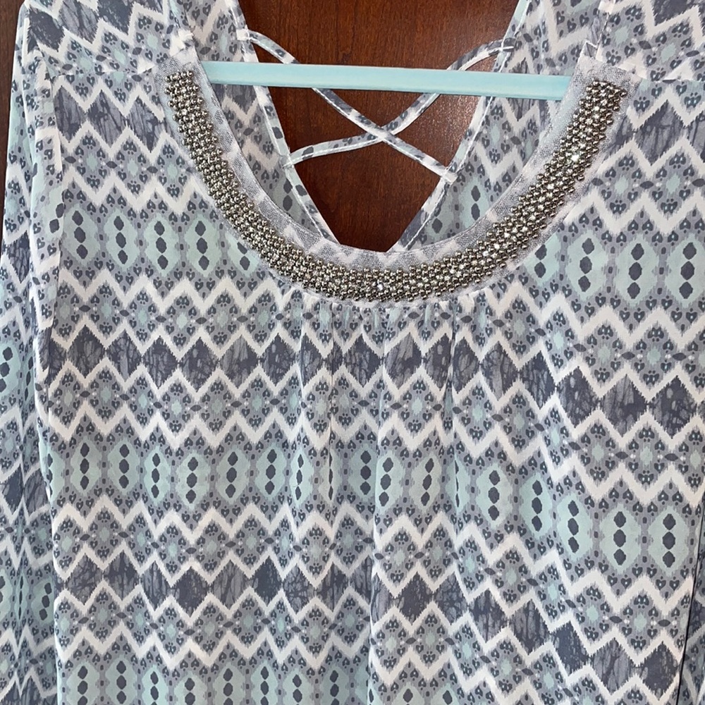 Maurice’s long sleeve blouse with rhinestones. Size large.